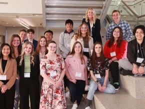 LR students take a group photo by main stairs at NCAS meeting