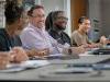 Seminary students in a classroom talking amongst themselves